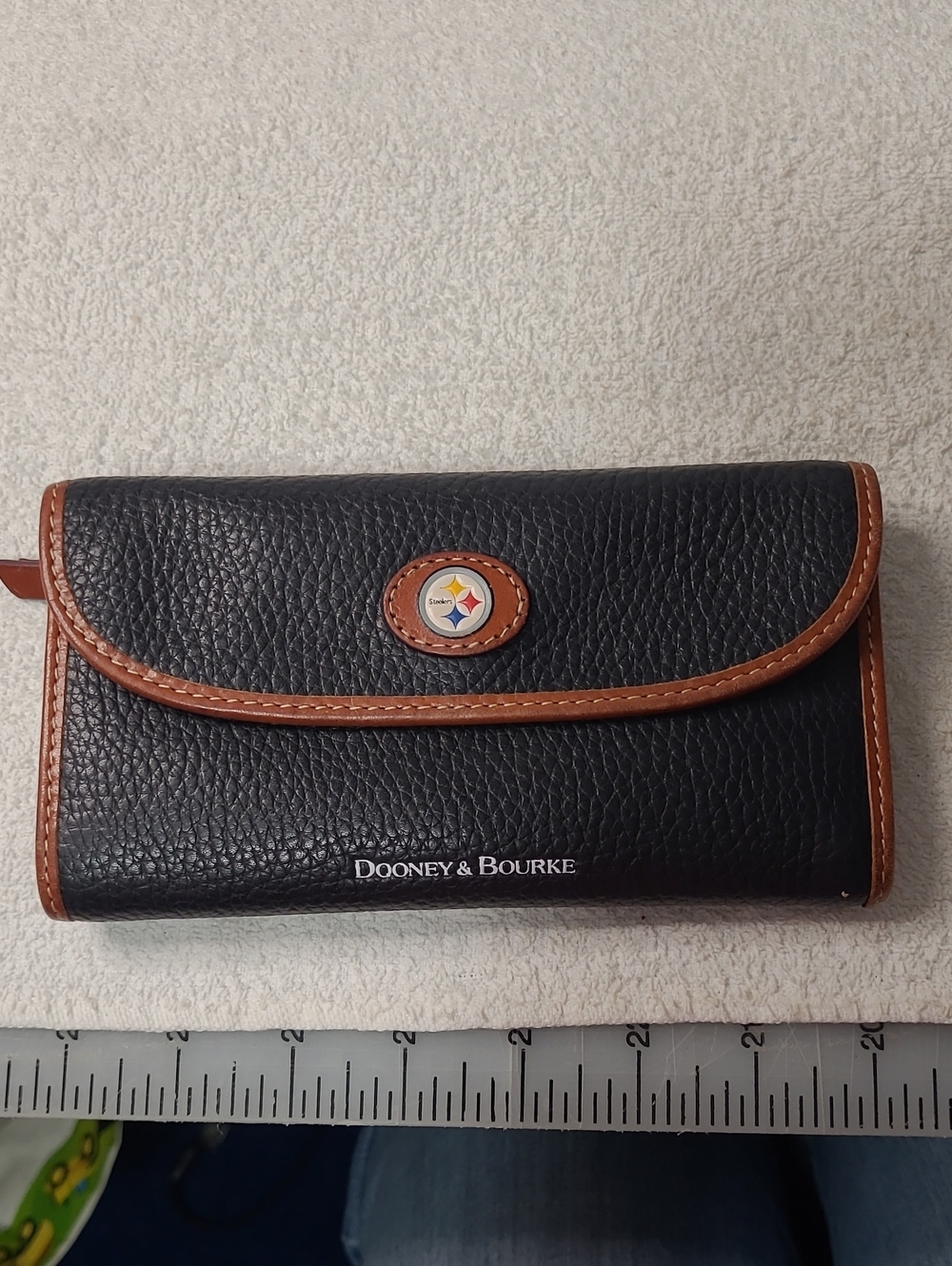 Dooney & Bourke Black Pebble Leather Continental Wallet with Brown Trim Steeler